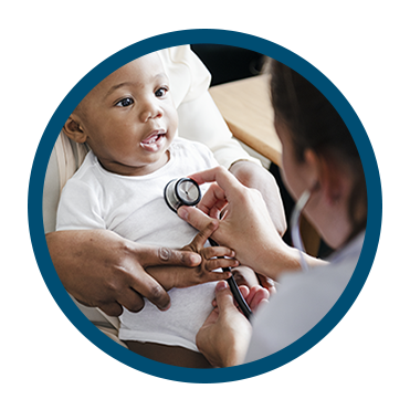 Compassionate health worker checking a babies heart with a stethoscope, exemplifying the principles of the Compassion Resilience Toolkit For Health and Human Services.