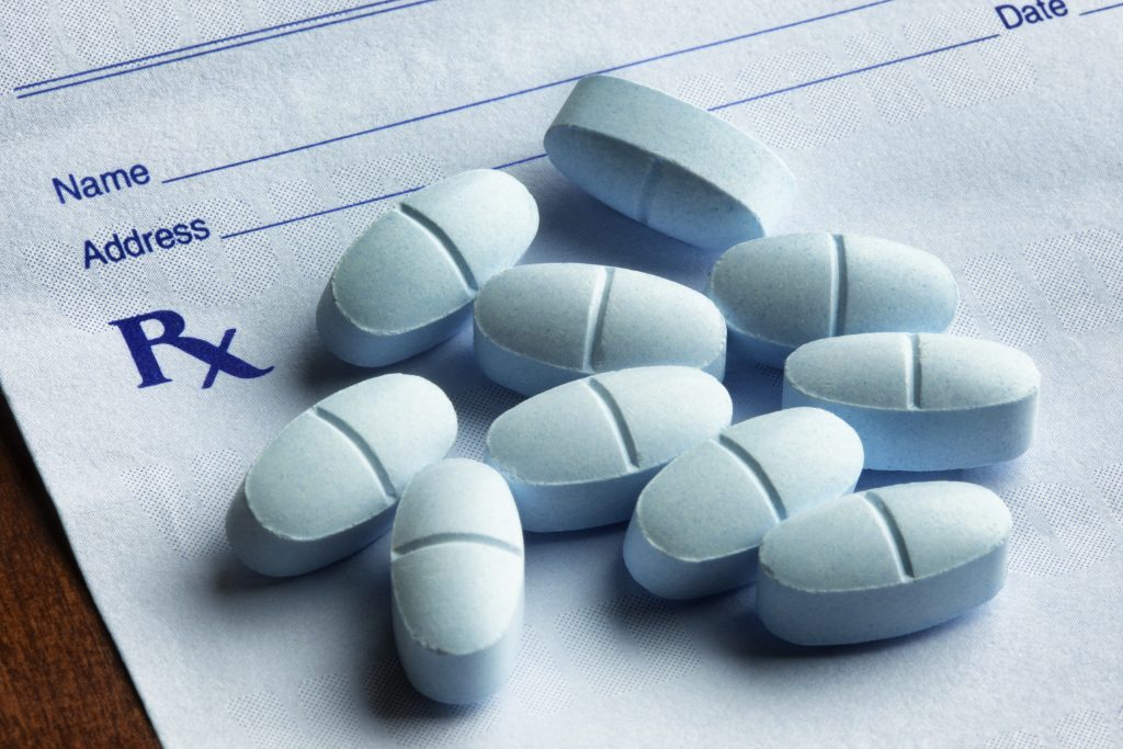 Tablets on a prescription form.
